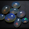 AWESOME - Full Blue Transparent - Ethiopian Opal - full Flashy Fire All Arround in Stone Amazing Quality - size 5.5 - 13 mm approx 8 pcs THIS IS TRULLY AMAZING QUALITY AND FULL FIRE VERY VERY RARE TO GET THIS QUALITY